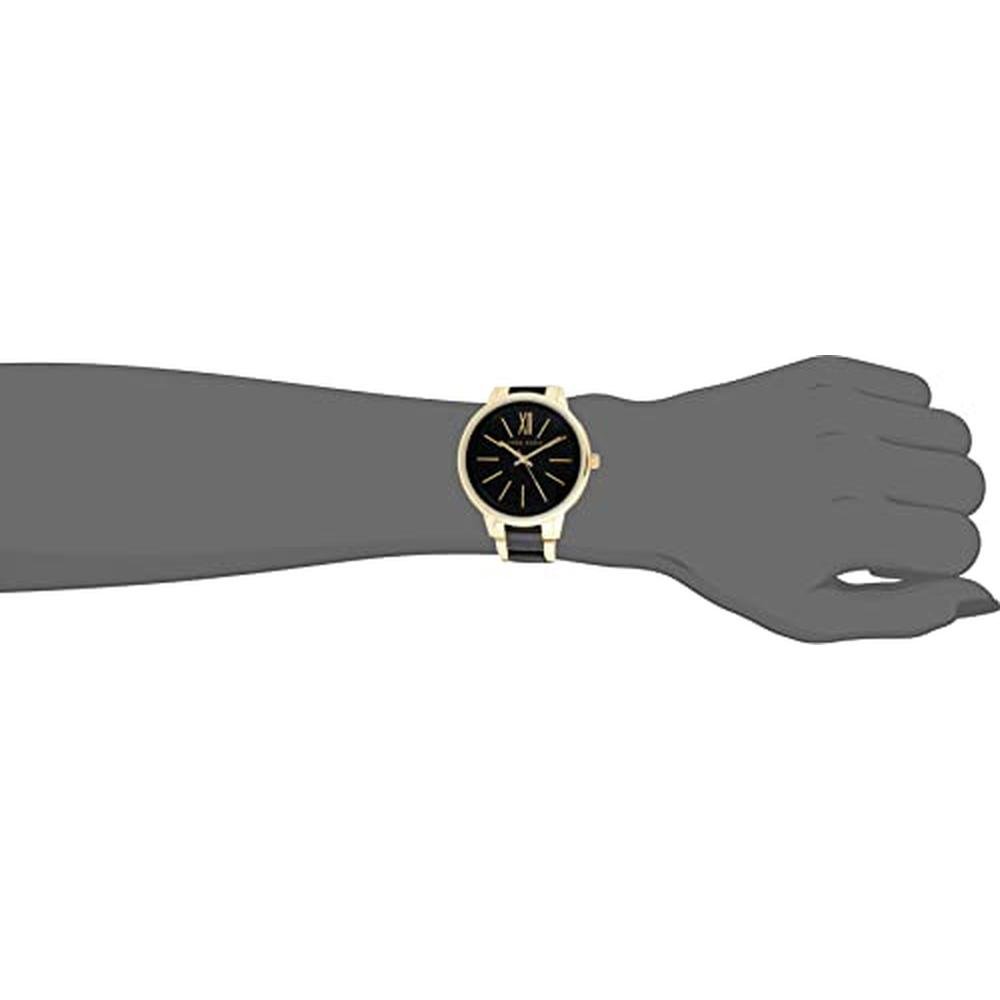 Anne Klein: AK 1412BKGb Gold Tone and Black Dress Watch – In Use